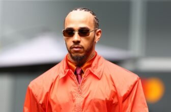 Lewis Hamilton turns heads with bold runway Saint ...